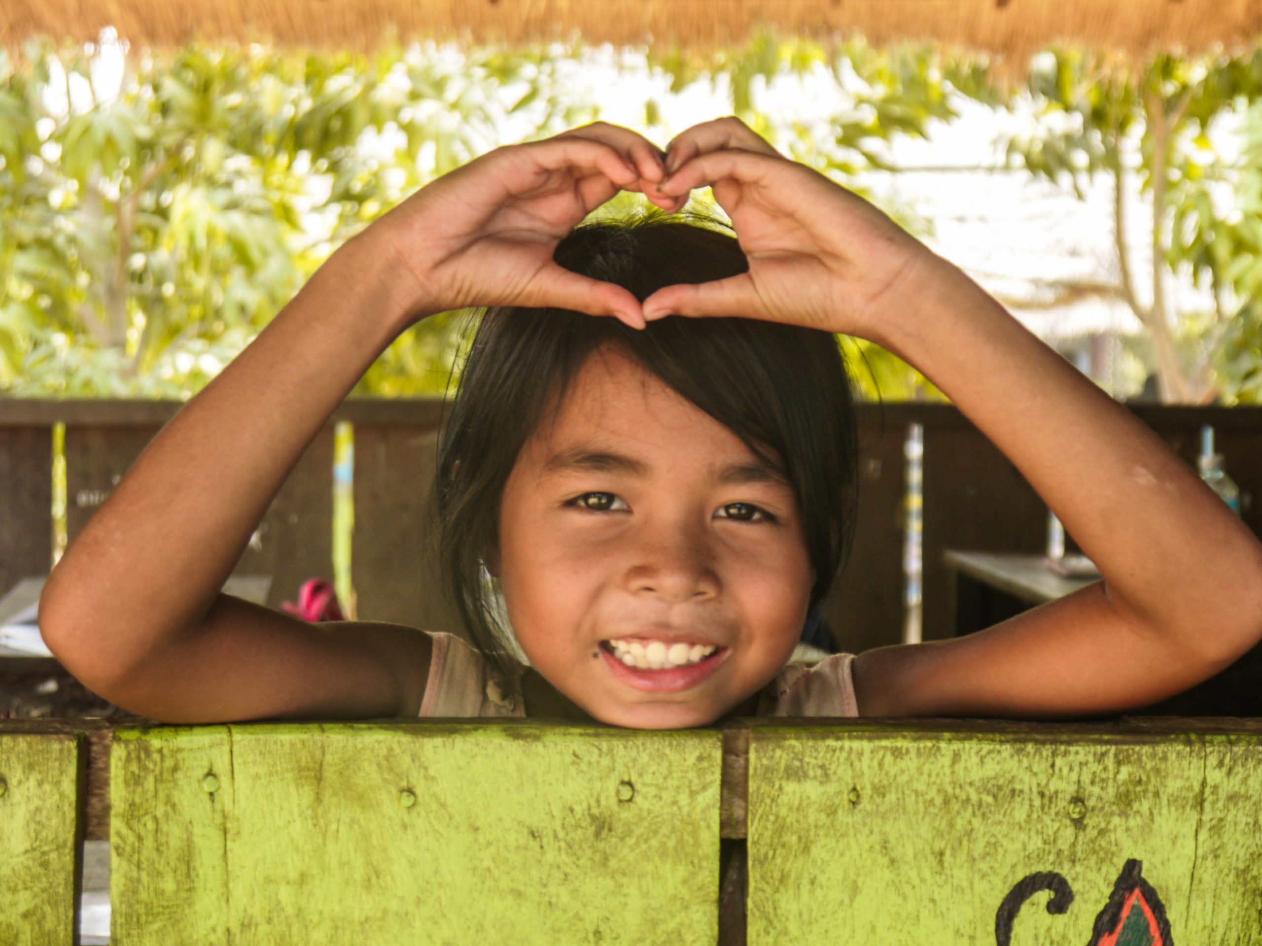 cambodia_students-student-making-heart-with-hands-3891