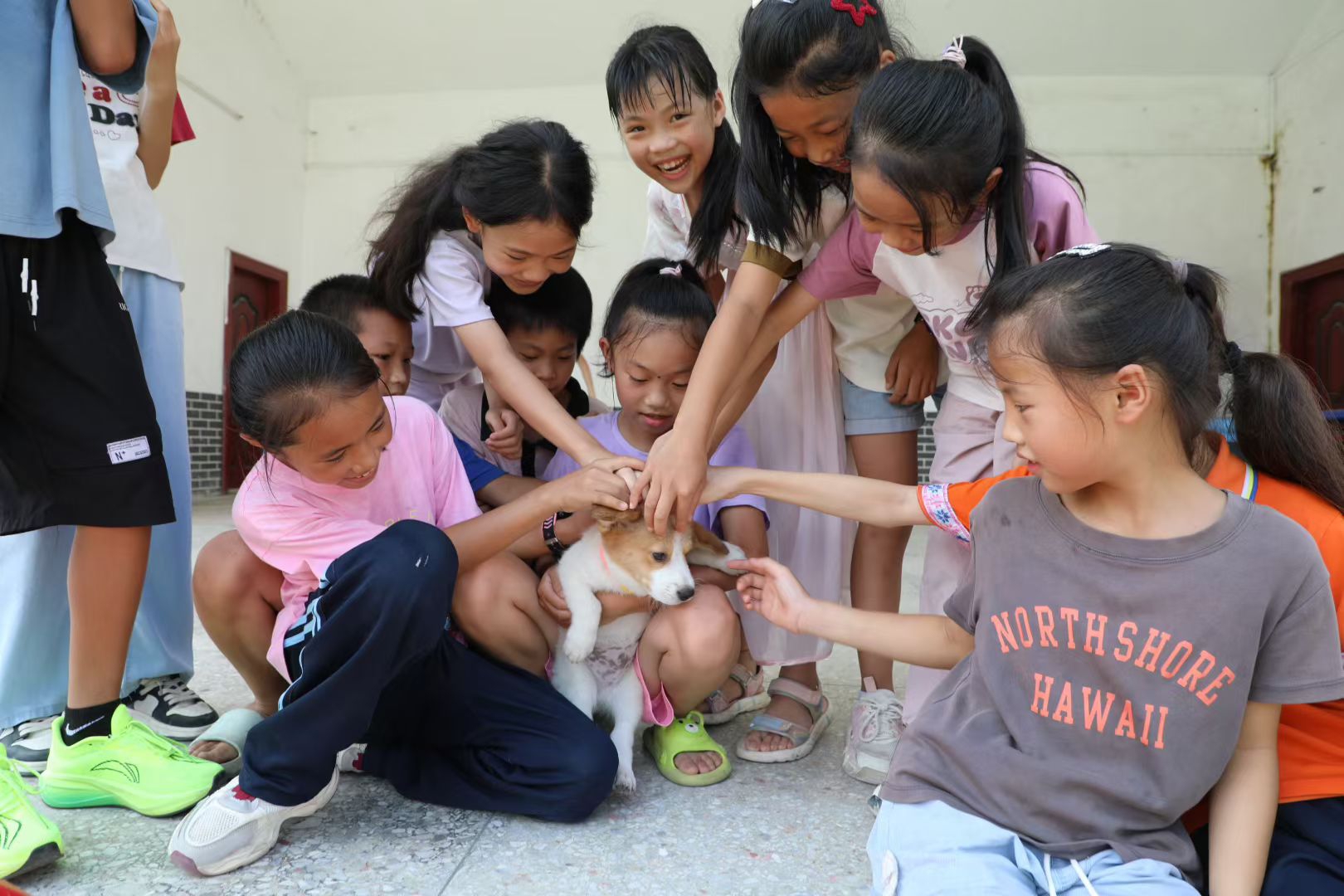 happy kids with cute puppy - lu lu